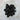 Black obsidian tumbled stone in polished volcanic glass with reflective surface